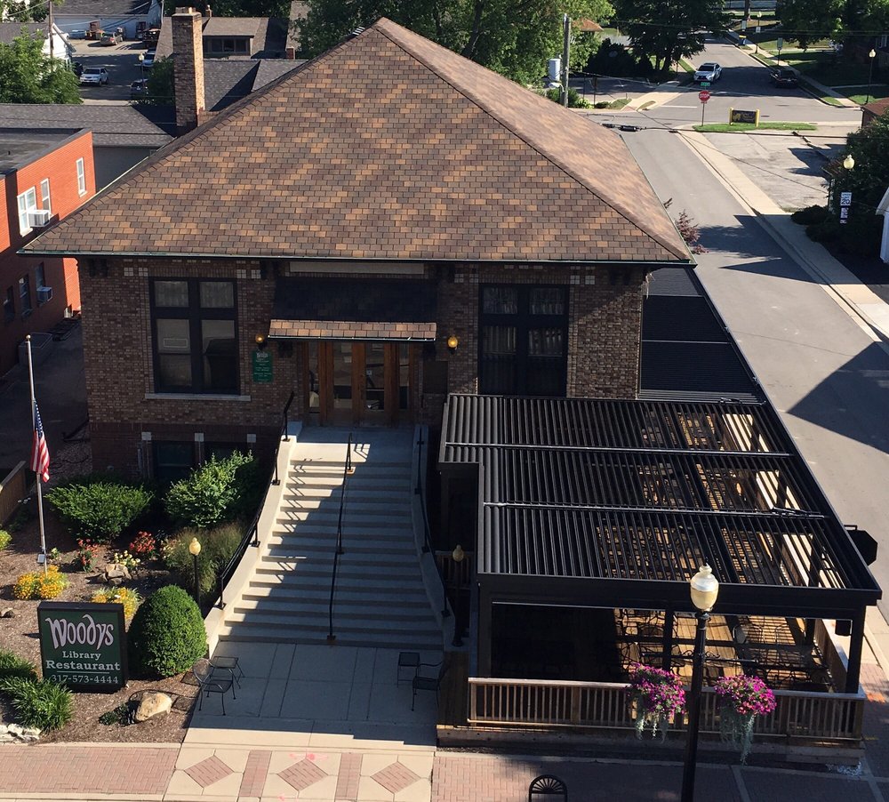 The historic Carnegie library building that houses Woodys