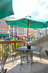 Outdoor tables on the Woodys patio